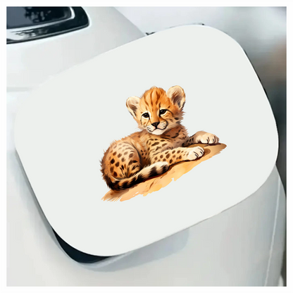Brown Cheetah Cub Resting On Ground Vinyl Sticker Decal