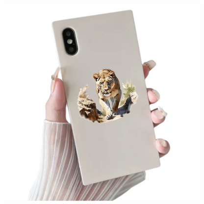 Brown Lioness Walking Between Desert Rocks Vinyl Sticker Decal