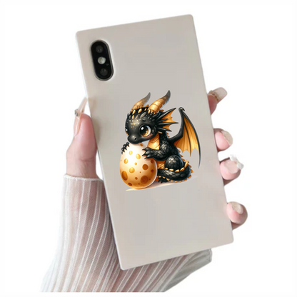 Black Baby Dragon Holding Egg Vinyl Sticker Decal