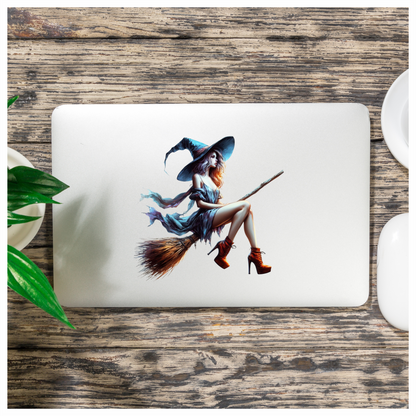 Woman in witch costume with blue hat and dress, sitting on a broomstick. Vinyl Decal Sticker